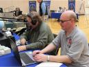 Radio Club of America Board Member Mike Clarson, WV2ZOW (left), and ARRL Field Services Manager Dave Patton, NN1N, operate the N1BCG special event. [Bob Inderbitzen, NQ1R, photo]